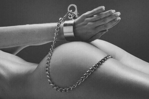 pierced, chained, cuffed